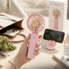Handy Phone Mini Fan Y03 is a portable, rechargeable handheld fan designed for personal cooling